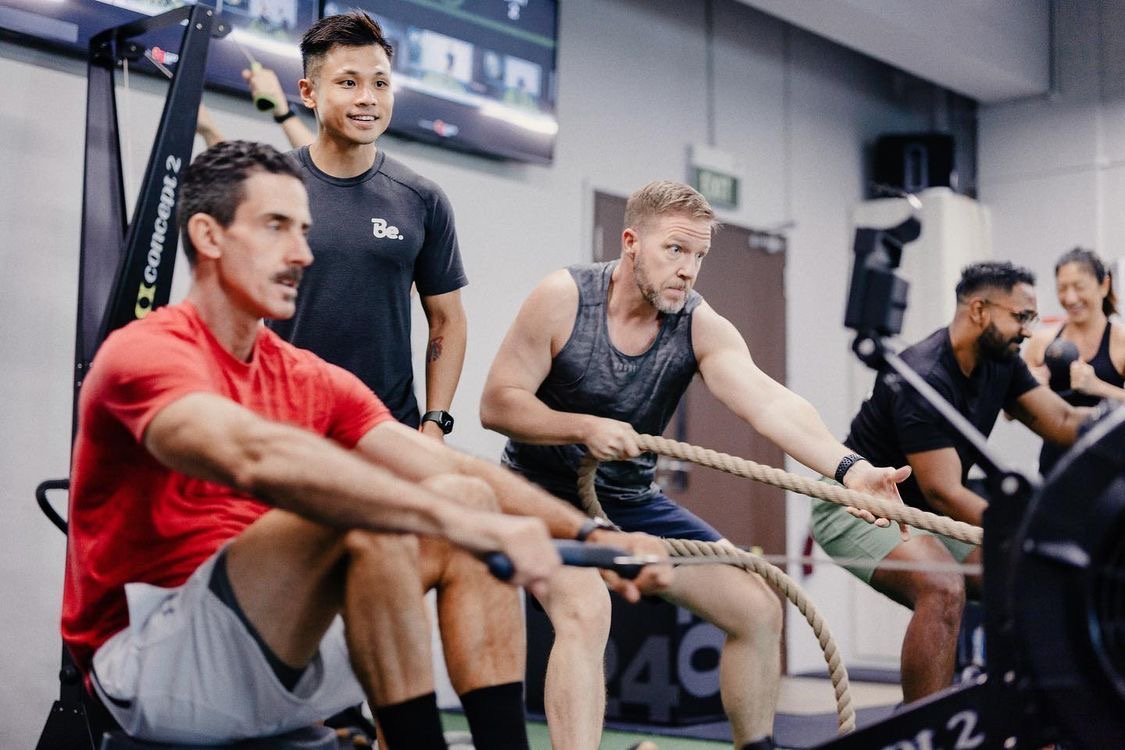 CloudFit running in a gym with a coach helping the class