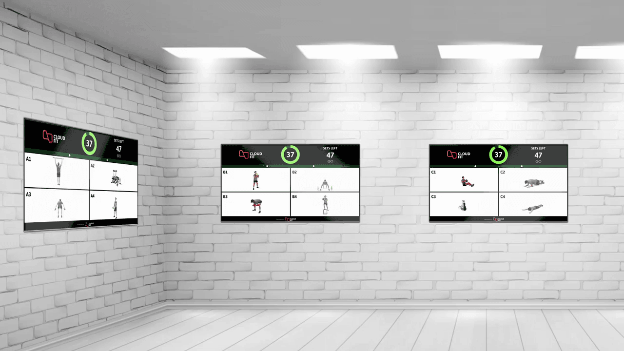 CloudFit running across multiple screens in a gym, with different content on each display