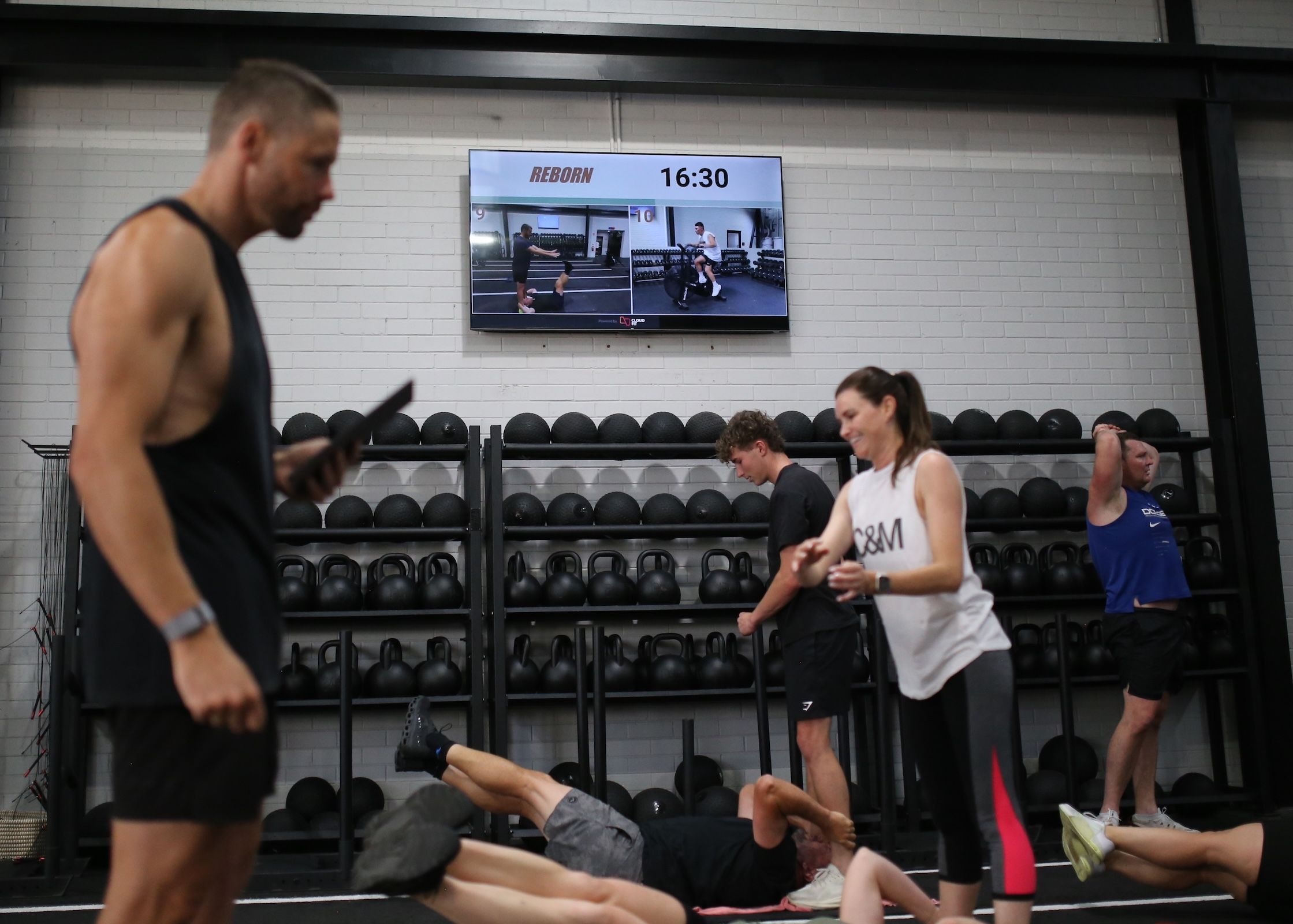 Strength class running with CloudFit on screen